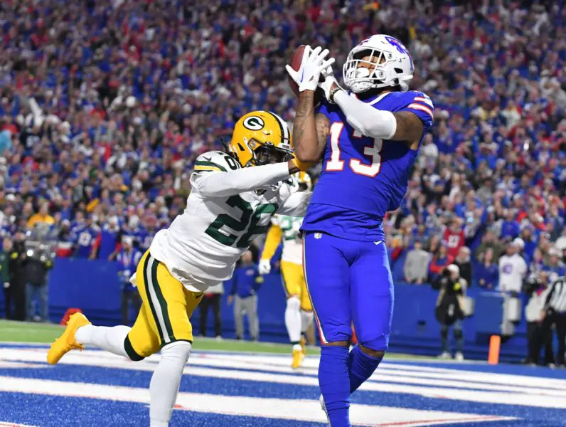 Oct 30, 2022; Orchard Park, New York, USA; Buffalo Bills wide receiver Gabe Davis (13) can't hold on to a catch in the end zone as Green Bay Packers safety Darnell Savage (26) defends in the second quarter at Highmark Stadium. Mandatory Credit: Mark Konezny-USA TODAY Sports