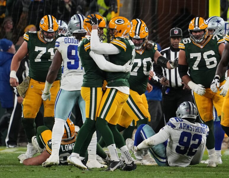Nov 13, 2022; Green Bay, Wisconsin, USA; Green Bay Packers place kicker Mason Crosby is embraced by punter Pat O'Donnell (16) after kicking the game-winning field goal during overtime during in their game against the Dallas Cowboys at Lambeau Field. Mandatory Credit: MARK HOFFMAN/MILWAUKEE JOURNAL SENTINEL