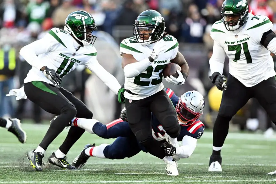 Nov 20, 2022; Foxborough, Massachusetts, USA; New York Jets running back James Robinson (23) breaks a tackle from New England Patriots safety Jabrill Peppers (3) during the second half at Gillette Stadium. Mandatory Credit: Brian Fluharty-USA TODAY Sports (Green Bay Packers)