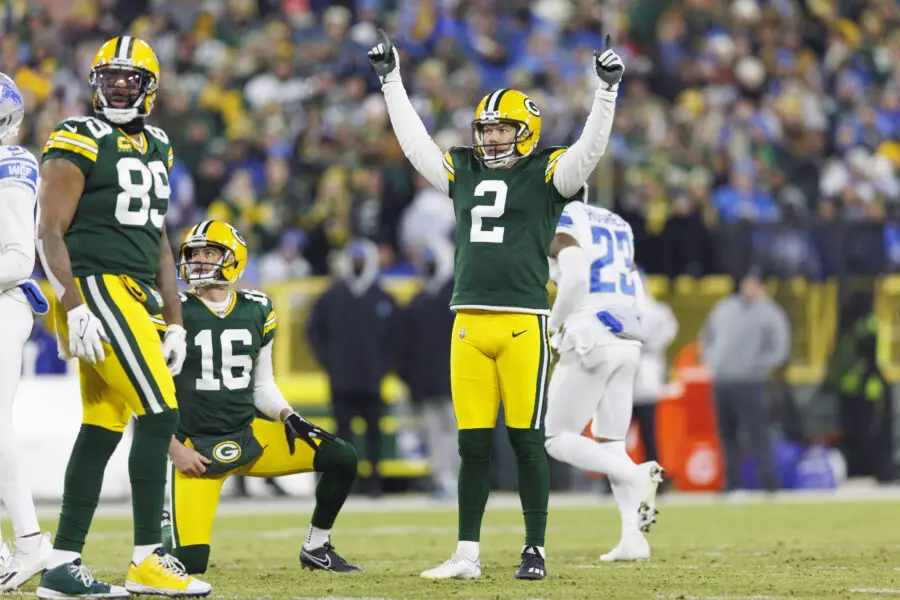 Jan 8, 2023; Green Bay, Wisconsin, USA; Green Bay Packers kicker Mason Crosby (2) celebrates after making a a field goal during the second quarter against the Detroit Lions at Lambeau Field. Mandatory Credit: Jeff Hanisch-USA TODAY Sports