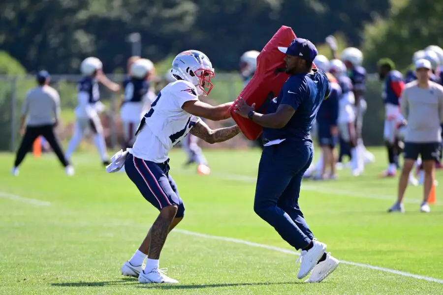 Aug 1, 2023; Foxborough, MA, USA; New England Patriots wide receiver Thyrick Pitts (13) works with coaching staff during training camp at Gillette Stadium. Mandatory Credit: Eric Canha-USA TODAY Sports (Green Bay Packers)