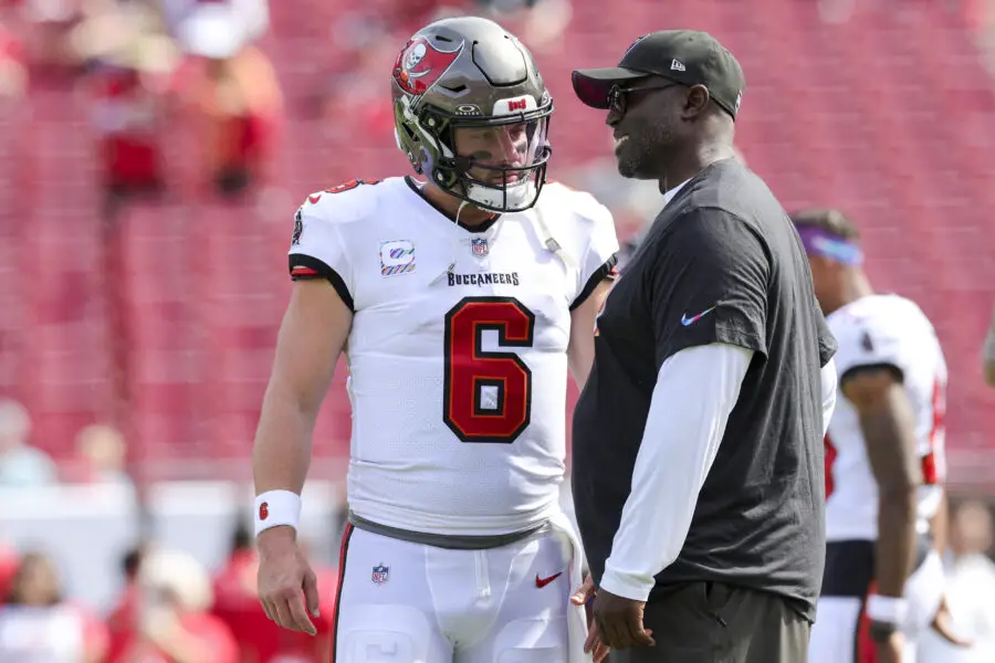 Oct 22, 2023; Tampa, Florida, USA; Tampa Bay Buccaneers quarterback Baker Mayfield (6) speaks to head coach Todd Bowles before a game against the Atlanta Falcons at Raymond James Stadium. Mandatory Credit: Nathan Ray Seebeck-USA TODAY Sports