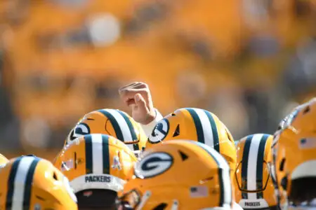 Nov 12, 2023; Pittsburgh, Pennsylvania, USA; Green Bay Packers quarterback Jordan Love raises his fist in a huddle before playing the Pittsburgh Steelers at Acrisure Stadium. Mandatory Credit: Philip G. Pavely-USA TODAY Sports