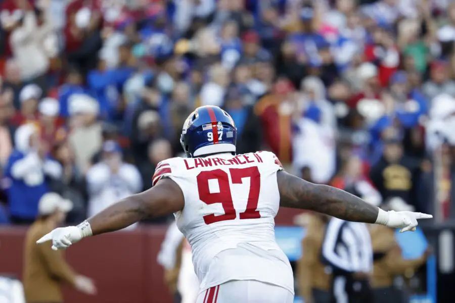 Nov 19, 2023; Landover, Maryland, USA; New York Giants defensive tackle Dexter Lawrence II (97) celebrates after an interception against the Washington Commanders during the fourth quarter at FedExField. Mandatory Credit: Geoff Burke-USA TODAY Sports (Green Bay Packers)