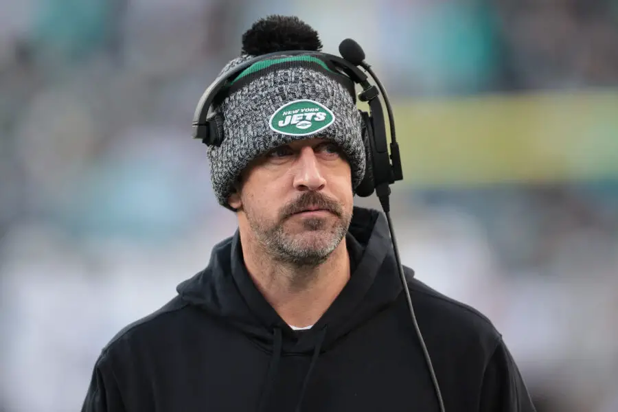 Nov 24, 2023; East Rutherford, New Jersey, USA; New York Jets quarterback Aaron Rodgers (8) on the sidelines during the first half against the Miami Dolphins at MetLife Stadium. Mandatory Credit: Vincent Carchietta-USA TODAY Sports (Green Bay Packers)