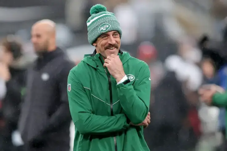 Dec 3, 2023; East Rutherford, New Jersey, USA; New York Jets quarterback Aaron Rodgers (8) watches warm ups before a game against the Atlanta Falcons at MetLife Stadium. Mandatory Credit: Brad Penner-USA TODAY Sports (Green Bay Packers)
