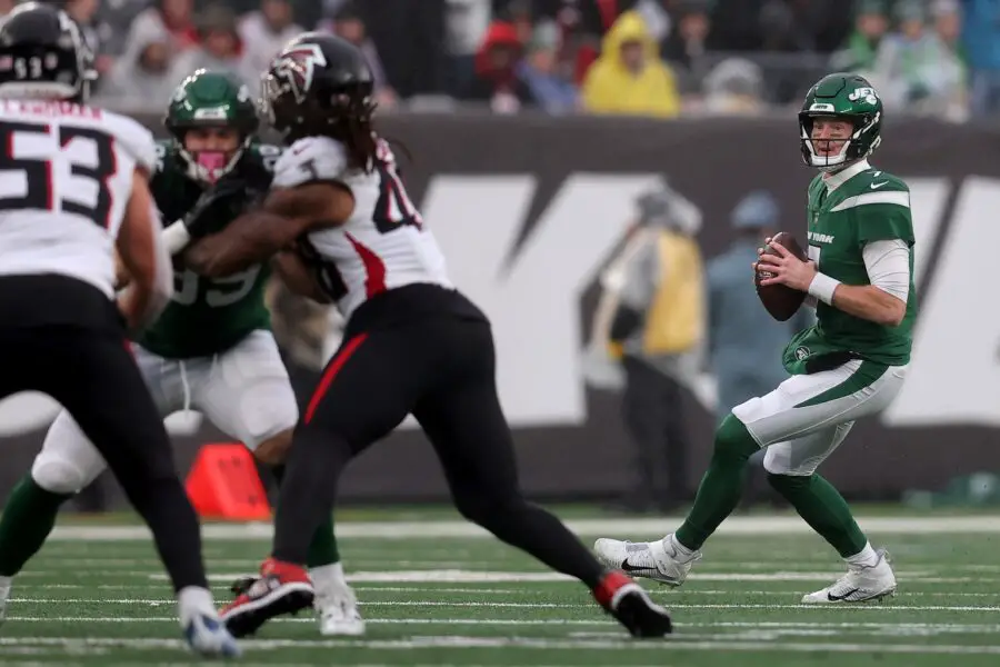 Dec 3, 2023; East Rutherford, New Jersey, USA; New York Jets quarterback Tim Boyle (7) looks to pass against the Atlanta Falcons during the first quarter at MetLife Stadium. Mandatory Credit: Brad Penner-USA TODAY Sports (Green Bay Packers)