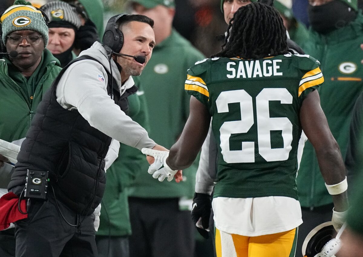 Dec 3, 2023; Green Bay, Wisconsin, USA; Green Bay Packers head coach Matt LaFleur congratulates safety Darnell Savage (26) during the second quarter game of their game against the Kansas City Chiefs at Lambeau Field. Mandatory Credit: Mark Hoffman-USA TODAY Sports