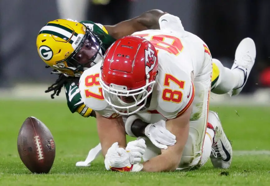 Green Bay Packers safety Darnell Savage (26) breaks up a pass intended for Kansas City Chiefs tight end Travis Kelce (87) during their football game Sunday, December 3, 2023, at Lambeau Field in Green Bay, Wis. Dan Powers/USA TODAY NETWORK-Wisconsin.