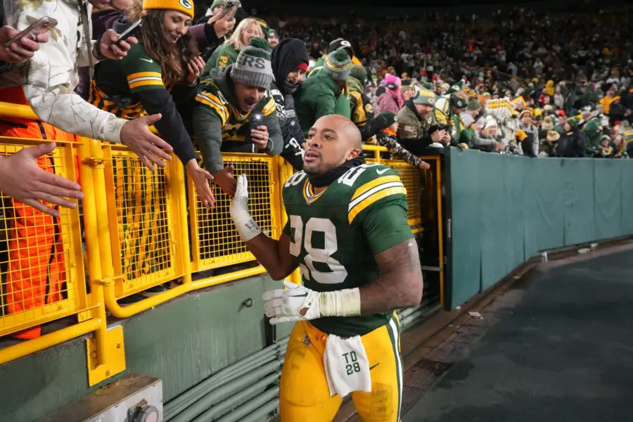Green Bay Packers running back AJ Dillon (28) makes a victory lap after their game Sunday, December 3, 2023 at Lambeau Field in Green Bay, Wisconsin. The Green Bay Packers beat the Kansas City Chiefs 27-19.