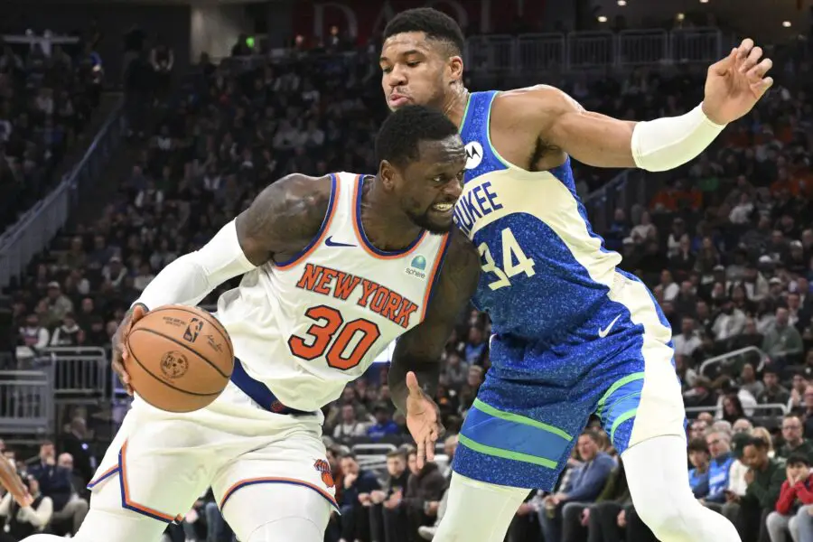 Dec 5, 2023; Milwaukee, Wisconsin, USA; New York Knicks forward Julius Randle (30) drives to the basket against Milwaukee Bucks forward Giannis Antetokounmpo (34) in the first half at Fiserv Forum. Mandatory Credit: Michael McLoone-USA TODAY Sports