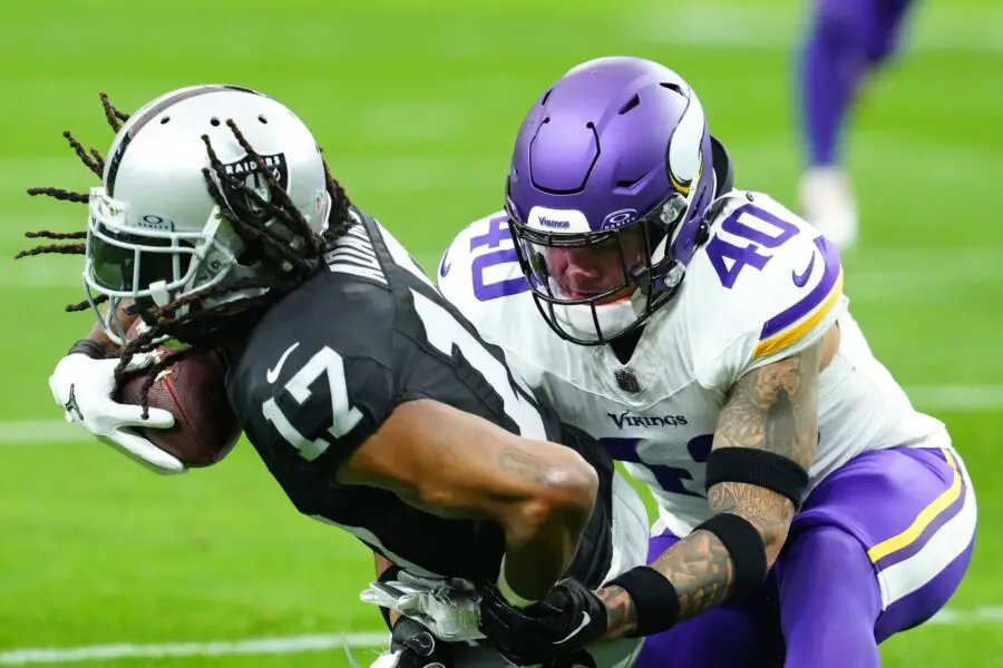 Dec 10, 2023; Paradise, Nevada, USA; Las Vegas Raiders wide receiver Davante Adams (17) is tackled by Minnesota Vikings linebacker Ivan Pace Jr. (40) during the first quarter at Allegiant Stadium. Mandatory Credit: Stephen R. Sylvanie-USA TODAY Sports (Green Bay Packers)