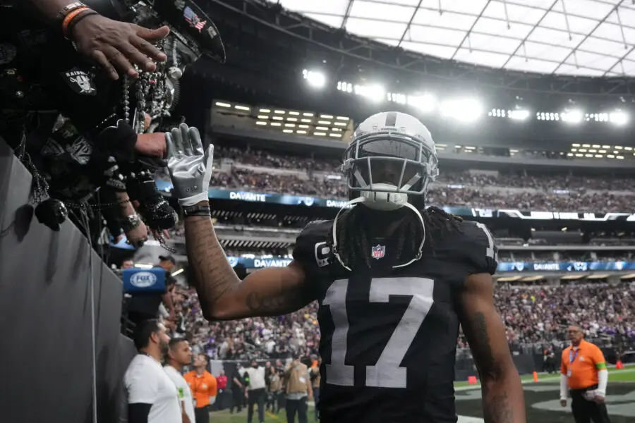 Dec 10, 2023; Paradise, Nevada, USA; Las Vegas Raiders wide receiver Davante Adams (17) is greeted by fans during teh game against the Minnesota Vikings at Allegiant Stadium. Mandatory Credit: Kirby Lee-USA TODAY Sports (Green Bay Packers)