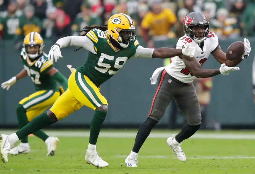 Tampa Bay Buccaneers wide receiver David Moore (19) breaks away from Green Bay Packers linebacker De'Vondre Campbell (59) for a 52-yard touchdown reception during their football game Sunday, December 17, 2023, at Lambeau Field in Green Bay, Wis. Dan Powers/USA TODAY NETWORK-Wisconsin.
