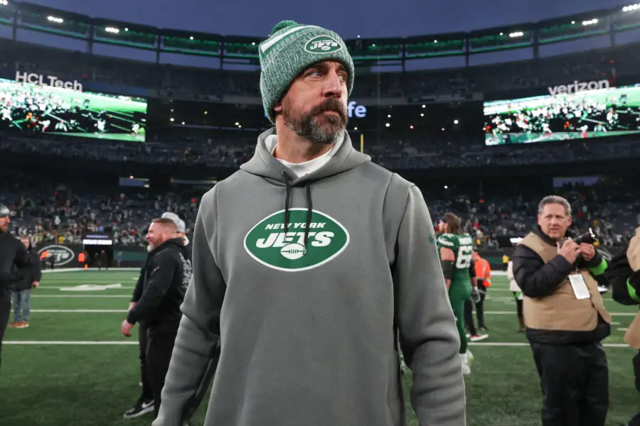 Dec 24, 2023; East Rutherford, New Jersey, USA; New York Jets quarterback Aaron Rodgers (8) on the field after the game against the Washington Commanders at MetLife Stadium. Mandatory Credit: Vincent Carchietta-USA TODAY Sports