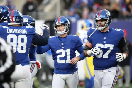 Dec 31, 2023; East Rutherford, New Jersey, USA; New York Giants place kicker Mason Crosby (21) is congratulated by teammates after a field goal during the second half against the Los Angeles Rams at MetLife Stadium. Mandatory Credit: Vincent Carchietta-USA TODAY Sports