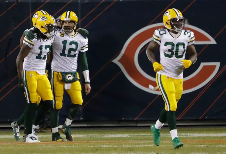 Green Bay Packers wide receiver Davante Adams (17) and quarterback Aaron Rodgers (12) celebate a fourth quarter touchdown score against the Chicago Bears at Soldier Field in Chicago. © Dan Powers/USA TODAY NETWORK-Wisconsin via Imagn Content Services, LLC