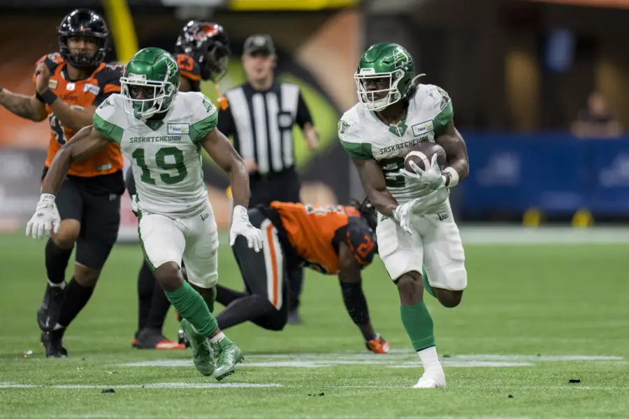 Aug 26, 2022; Vancouver, British Columbia, CAN; Saskatchewan Roughriders wide receiver Samuel Emilus (19) and running back Frankie Hickson (20) run upfield against the BC Lions in the second half at BC Place. Mandatory Credit: Bob Frid-USA TODAY Sports (Green Bay Packers)