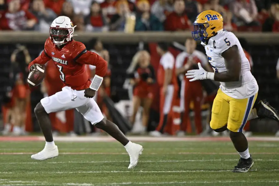 Oct 22, 2022; Louisville, Kentucky, USA; Louisville Cardinals quarterback Malik Cunningham (3) scrambles to find an open receiver against Pittsburgh Panthers defensive lineman Deslin Alexandre (5) during the second quarter at Cardinal Stadium. Mandatory Credit: Jamie Rhodes-USA TODAY Sports (Green Bay Packers)