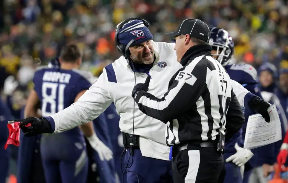 Tennessee Titans head coach Mike Vrabel talks with an official to get an incomplete pass changed to a touchdown call in the fourth quarter against the Green Bay Packers during their football game Thursday, November 17, at Lambeau Field in Green Bay, Wis. Dan Powers/USA TODAY NETWORK-Wisconsin (Wisconsin Badgers)