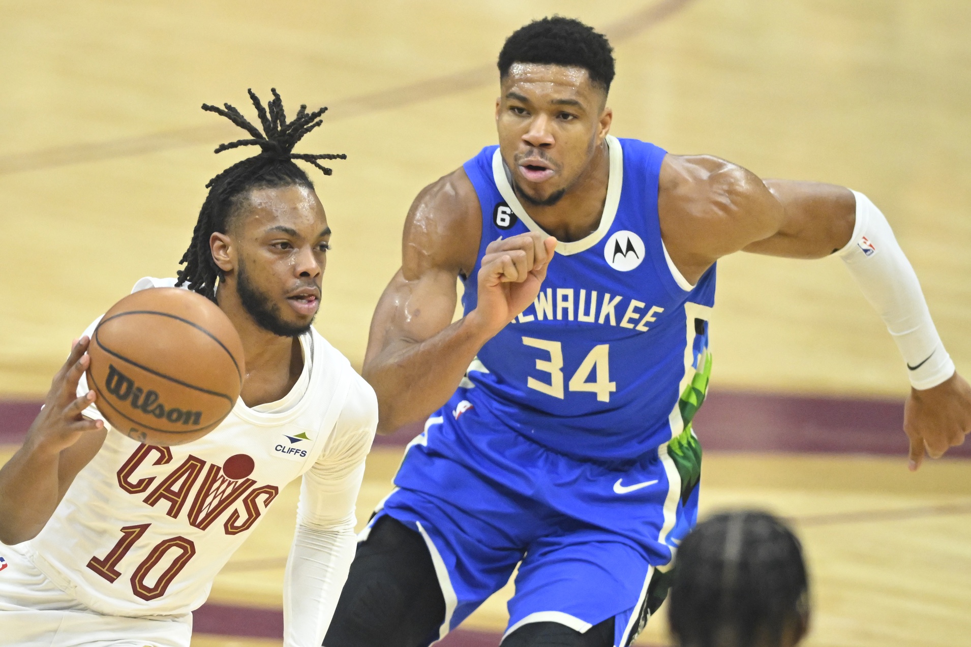 Dec 21, 2022; Cleveland, Ohio, USA; Cleveland Cavaliers guard Darius Garland (10) dribbles beside Milwaukee Bucks forward Giannis Antetokounmpo (34) in the first quarter at Rocket Mortgage FieldHouse. Mandatory Credit: David Richard-USA TODAY Sports
