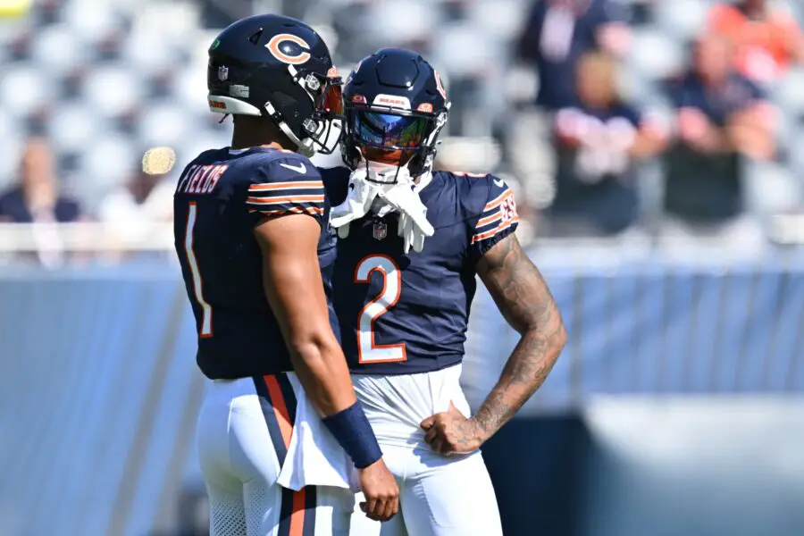 Oct 1, 2023; Chicago, Illinois, USA; Chicago Bears wide receiver DJ Moore (2) talks with quarterback Justin Fields (1) before a game against the Denver Broncos at Soldier Field. Mandatory Credit: Jamie Sabau-USA TODAY Sports (Green Bay Packers)