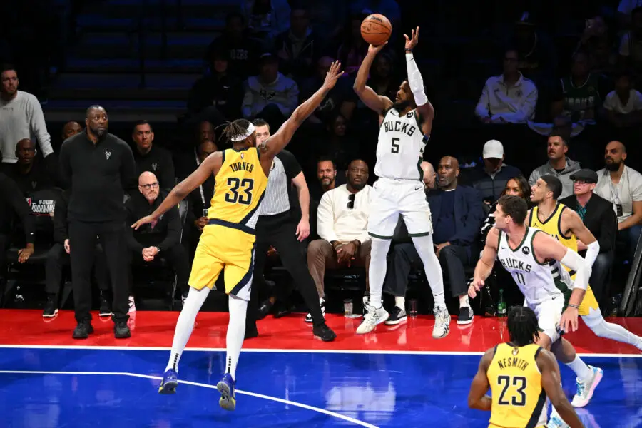Dec 7, 2023; Las Vegas, Nevada, USA; Milwaukee Bucks guard Malik Beasley (5) shoots as Indiana Pacers center Myles Turner (33) defends during the fourth quarter at T-Mobile Arena. Mandatory Credit: Candice Ward-USA TODAY Sports