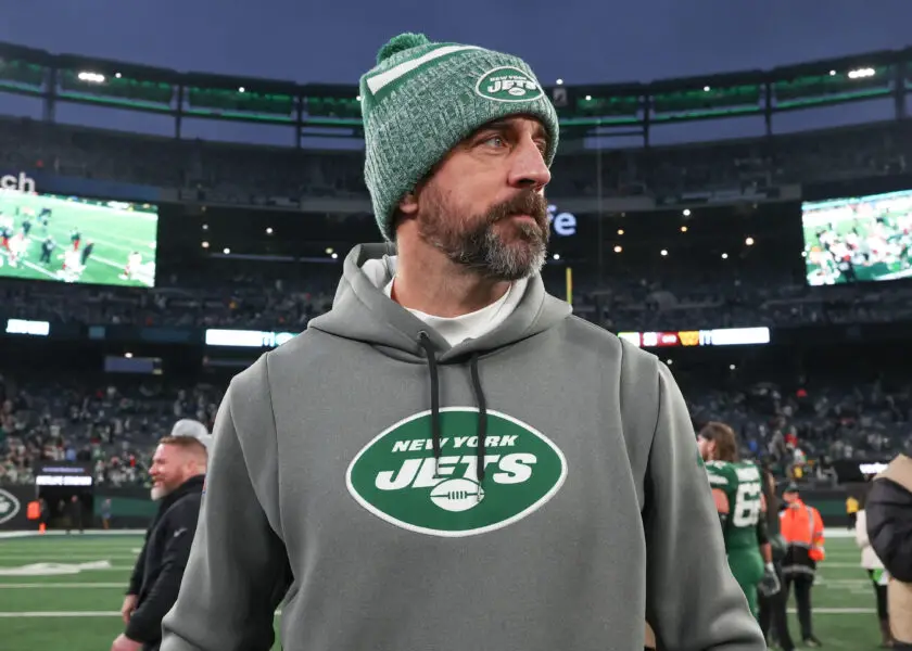 Dec 24, 2023; East Rutherford, New Jersey, USA; New York Jets quarterback Aaron Rodgers (8) on the field after the game against the Washington Commanders at MetLife Stadium. Mandatory Credit: Vincent Carchietta-USA TODAY Sports
