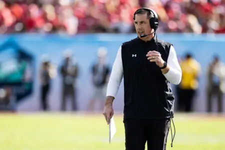 Jan 1, 2024; Tampa, FL, USA; Wisconsin Badgers head coach Luke Fickell talks on the headset during the second half against the LSU Tigers at the Reliaquest Bowl at Raymond James Stadium. Mandatory Credit: Matt Pendleton-USA TODAY Sports