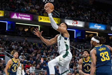 Jan 3, 2024; Indianapolis, Indiana, USA; Milwaukee Bucks forward Giannis Antetokounmpo (34) shoots the ball while Indiana Pacers center Myles Turner (33) defends in the second quarter at Gainbridge Fieldhouse. Mandatory Credit: Trevor Ruszkowski-USA TODAY Sports