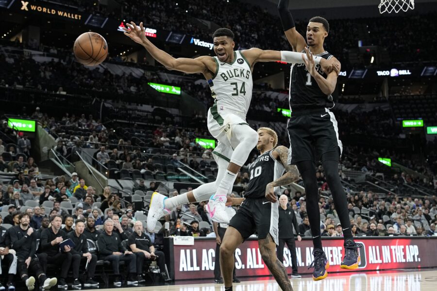 Jan 4, 2024; San Antonio, Texas, USA; Milwaukee Bucks forward Giannis Antetokounmpo (34) loses control of the ball while driving to the basket against San Antonio Spurs forward Victor Wembanyama (1) during the first half at Frost Bank Center. Mandatory Credit: Scott Wachter-USA TODAY Sports