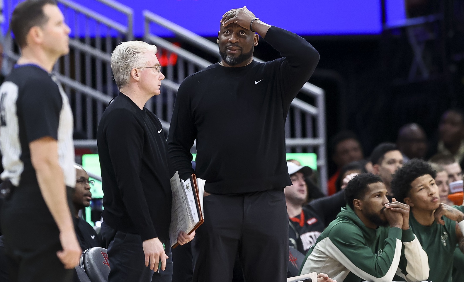 Jan 6, 2024; Houston, Texas, USA; Milwaukee Bucks head coach Adrian Griffin (right) reacts after a play during the third quarter against the Houston Rockets at Toyota Center. Mandatory Credit: Troy Taormina-USA TODAY Sports