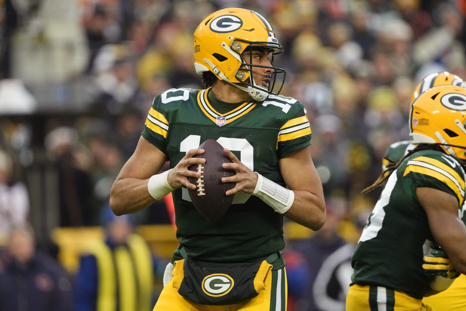 Jan 7, 2024; Green Bay, Wisconsin, USA; Green Bay Packers quarterback Jordan Love (10) drops back to pass during the first quarter against the Chicago Bears at Lambeau Field. Mandatory Credit: Jeff Hanisch-USA TODAY Sports