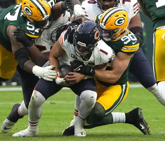 Green Bay Packers linebacker Lukas Van Ness (90) sacks Chicago Bears quarterback Justin Fields (1) during the first quarter of their game Sunday, January 7, 2024 at Lambeau Field in Green Bay, Wisconsin.Mark Hoffman/Milwaukee Journal Sentinel