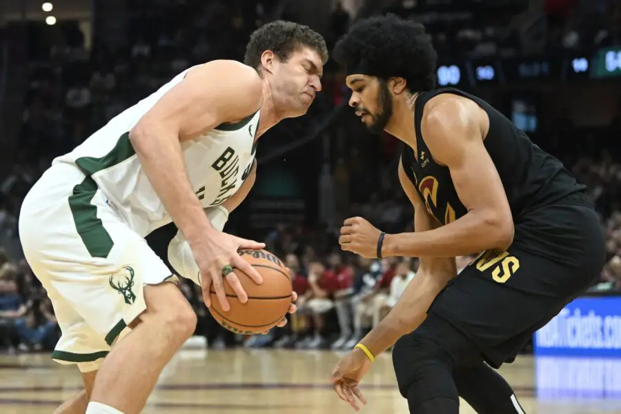 Jan 17, 2024; Cleveland, Ohio, USA; Milwaukee Bucks center Brook Lopez (11) drives to the basket against Cleveland Cavaliers center Jarrett Allen (31) during the second half at Rocket Mortgage FieldHouse. Mandatory Credit: Ken Blaze-USA TODAY Sports