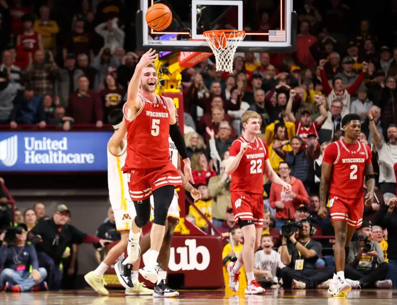 Wisconsin basketball forward Tyler Wahl celebrates a win over the rival Minnesota Gophers. The Big Ten will determine two-play opponents, in part, with consideration of rivalries.