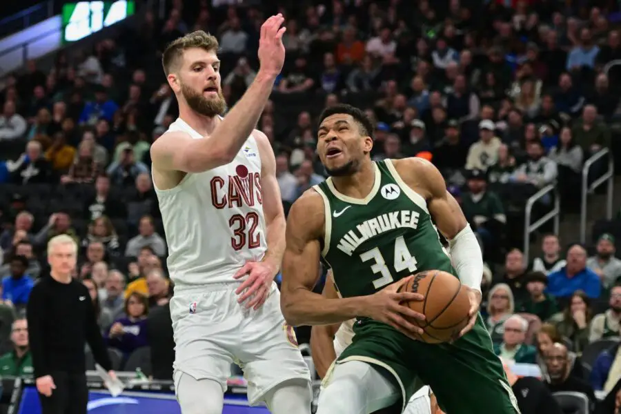 Jan 24, 2024; Milwaukee, Wisconsin, USA; Milwaukee Bucks forward Giannis Antetokounmpo (34) looks for a shot against Cleveland Cavaliers forward Dean Wade (32) in the second quarter at Fiserv Forum. Mandatory Credit: Benny Sieu-USA TODAY Sports