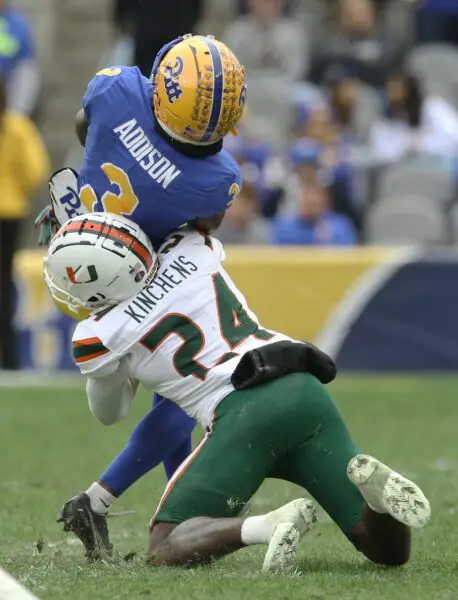 Oct 30, 2021; Pittsburgh, Pennsylvania, USA; Miami Hurricanes safety Kamren Kinchens (24) tackles Pittsburgh Panthers wide receiver Jordan Addison (3) during the second quarter at Heinz Field. Miami won 38-34. Mandatory Credit: Charles LeClaire-USA TODAY Sports (Green Bay Packers)