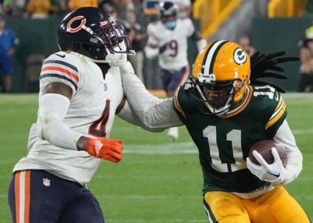 Green Bay Packers wide receiver Sammy Watkins (11) stiff arms Chicago Bears safety Eddie Jackson (4) while picking up 14 yards on a reception during the fourth quarter of their game Sunday, September 18, 2022 at Lambeau Field in Green Bay, Wis. The Green Bay Packers beat the Chicago Bears 27-10. © MARK HOFFMAN/MILWAUKEE JOURNAL SENTINEL / USA TODAY NETWORK