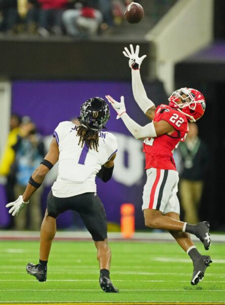 Jan 9, 2023; Inglewood, CA, USA; Georgia Bulldogs defensive back Javon Bullard (22) intercepts a pass intended for TCU Horned Frogs wide receiver Quentin Johnston (1) during the second quarter of the CFP national championship game at SoFi Stadium. Mandatory Credit: Kirby Lee-USA TODAY Sports