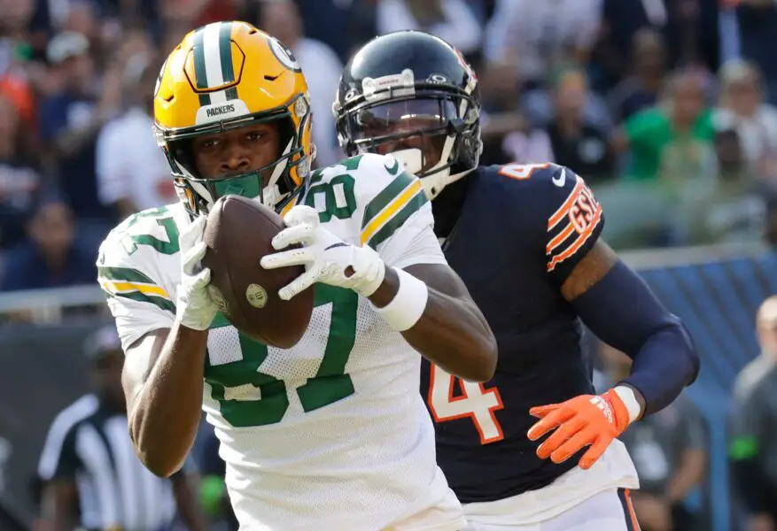 Green Bay Packers wide receiver Romeo Doubs (87) catches a touchdown pass against Chicago Bears safety Eddie Jackson (4) in the first quarter during their football game Sunday, September 10, 2023, at Soldier Field in Chicago, Ill.