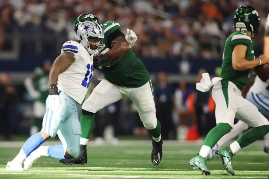 Sep 17, 2023; Arlington, Texas, USA; Dallas Cowboys linebacker Micah Parsons (11) rushes the quarterback against New York Jets offensive tackle Duane Brown (76) in the fourth quarter at AT&T Stadium. Mandatory Credit: Tim Heitman-USA TODAY Sports (Aaron Rodgers - Green Bay Packers)