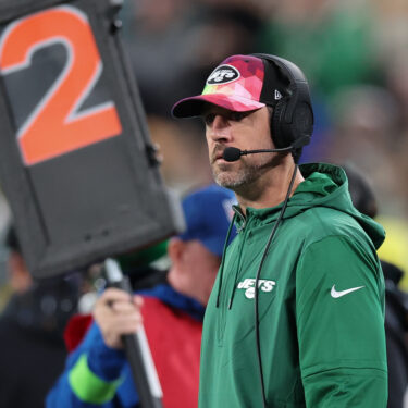 Oct 15, 2023; East Rutherford, New Jersey, USA; New York Jets quarterback Aaron Rodgers (8) looks on during the second half against the Philadelphia Eagles at MetLife Stadium. Mandatory Credit: Vincent Carchietta-USA TODAY Sports