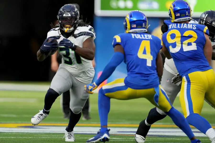 Nov 19, 2023; Inglewood, California, USA; Seattle Seahawks running back DeeJay Dallas (31) runs against Los Angeles Rams safety Jordan Fuller (4) in the second quarter at SoFi Stadium. Mandatory Credit: Kirby Lee-USA TODAY Sports (Green Bay Packers)