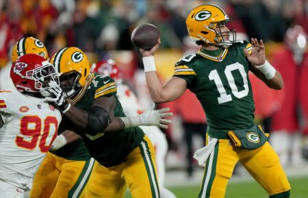 Green Bay Packers quarterback Jordan Love (10) throws a pass for a first down during the second quarter of their game against the Kansas City Chiefs Sunday, December 3, 2023 at Lambeau Field in Green Bay, Wisconsin. © Mark Hoffman/Milwaukee Journal Sentinel / USA TODAY NETWORK