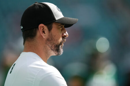 Dec 17, 2023; Miami Gardens, Florida, USA; New York Jets quarterback Aaron Rodgers stands on the field prior to the game against the Miami Dolphins Hard Rock Stadium. Mandatory Credit: Jasen Vinlove-USA TODAY Sports
