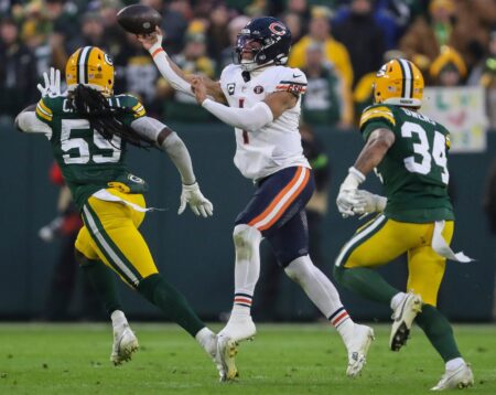 Chicago Bears quarterback Justin Fields (1) throws a pass against the Green Bay Packers on Sunday, January 7, 2024, at Lambeau Field in Green Bay, Wis. The Packers won the game, 17-9, to clinch an NFC playoff berth. Tork Mason/USA TODAY NETWORK-Wisconsin