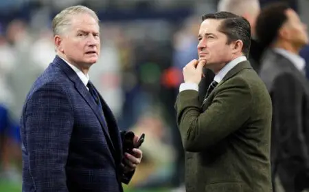 Jan 14, 2024; Arlington, Texas, USA; Green Bay Packers chief operating officer and general council Ed Policy, right, is shown with executive vice president/director of football operations Russ Ball before their team s wild card playoff game against the Dallas Cowboys Sunday, January 14, 2024 in Arlington, Texas. Mandatory Credit: Mark Hoffman-USA TODAY Sports
