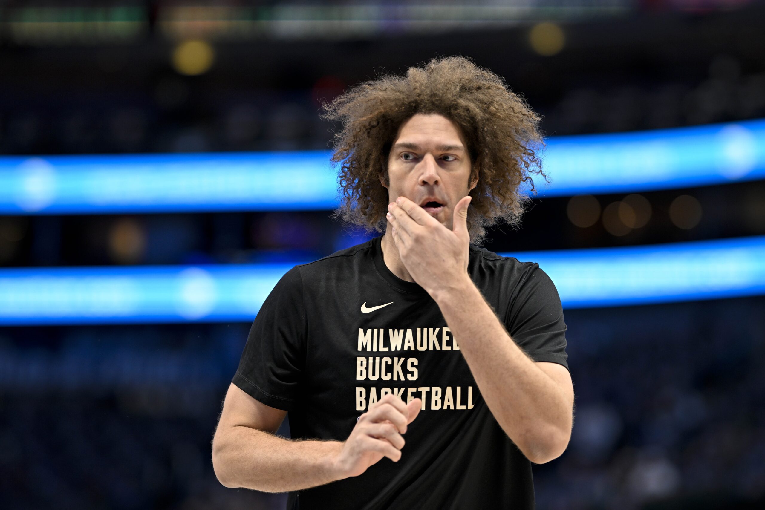 Feb 3, 2024; Dallas, Texas, USA; Milwaukee Bucks center Robin Lopez (42) warms up before the game between the Dallas Mavericks and the Milwaukee Bucks at the American Airlines Center. Mandatory Credit: Jerome Miron-USA TODAY Sports