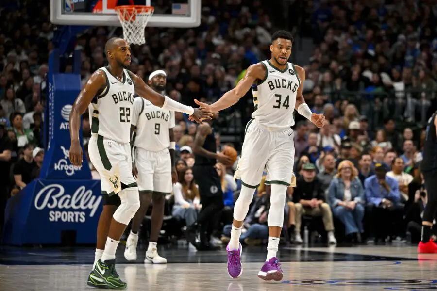 Feb 3, 2024; Dallas, Texas, USA; Milwaukee Bucks forward Khris Middleton (22) and forward Giannis Antetokounmpo (34) celebrate during the second quarter against the Dallas Mavericks at the American Airlines Center. Mandatory Credit: Jerome Miron-USA TODAY Sports